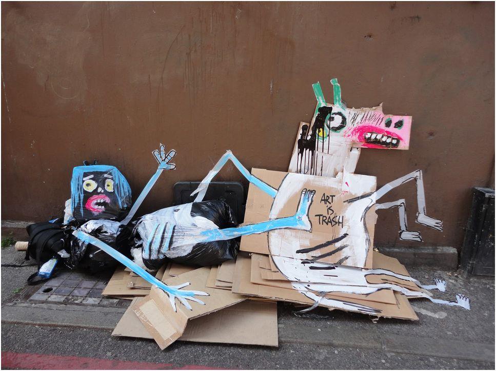 garbage painted to look human monsters faces francisco de pajaro london banksy brick lane 12